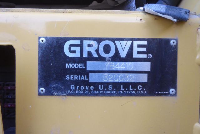Grove crane identification plate on yellow equipment showing model YB4410 and serial 320032.