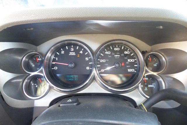 Dashboard view of a 2011 Chevrolet 2500HD showing tachometer, speedometer, and various gauge clusters.