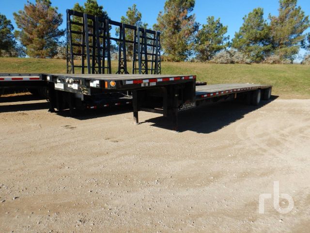 Flatbed trailer showing gooseneck/low deck with loading ramps in back, Fontaine logo visible on the side, rear view suggesting 40 ton capacity.