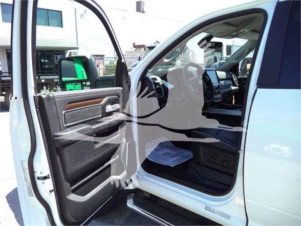 Ram 5500 truck interior door area showing front passenger seat and dashboard visible through open door.
