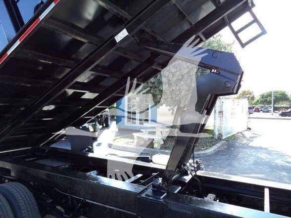 Ford E450 dump truck chassis with hydraulic bed in elevation view showing metal framework and hydraulic components.
