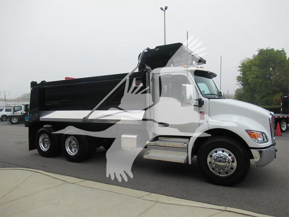 Kenworth T480 dump truck in white and black, side view showing dump bed raised. Logo watermark over image.