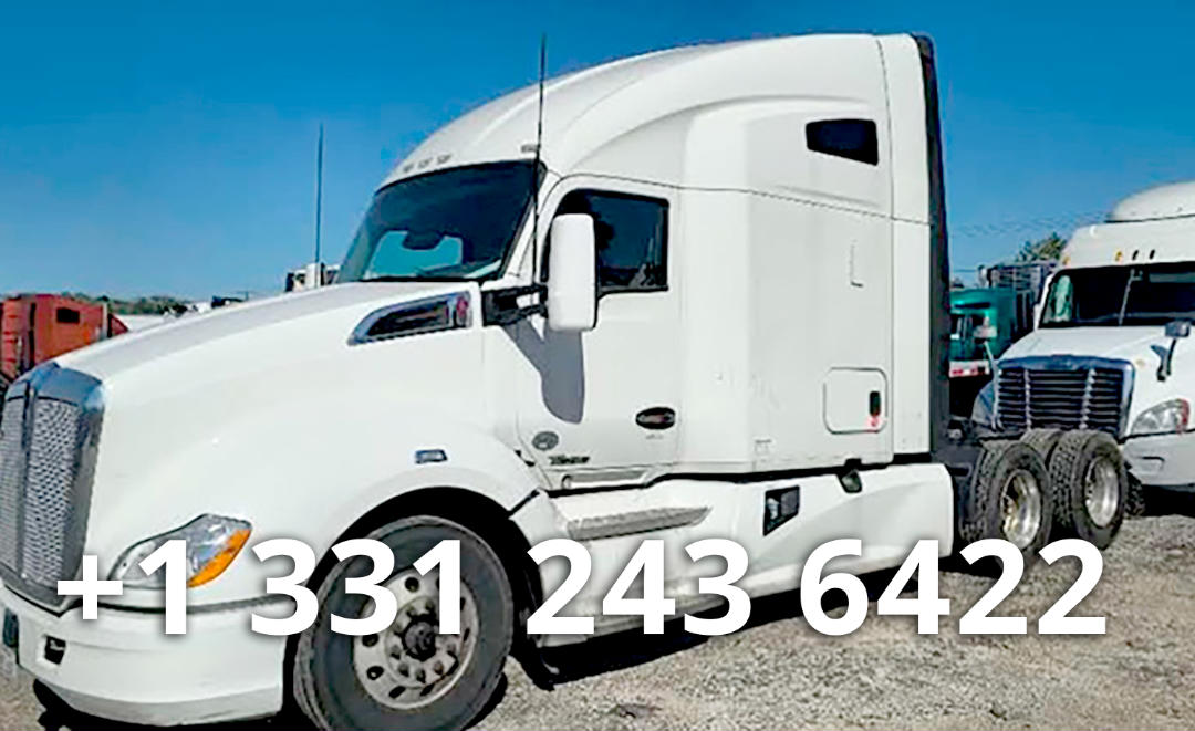 Kenworth T680 heavy haul truck in white, side view showing sleeper cab and front wheel area.
