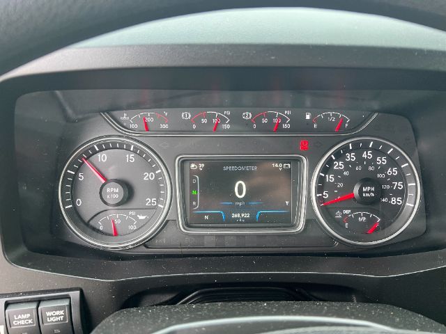 Dashboard of a 2019 International LT625 truck showing speedometer, tachometer, and digital display with zero speed; gauges include RPM, fuel, and coolant temperature.
