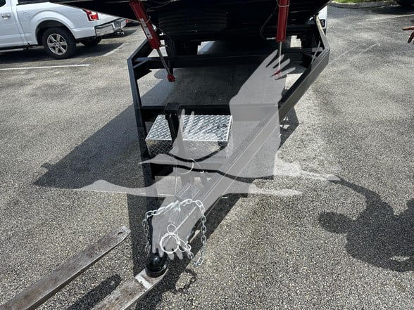 Flatbed trailer hitch and front frame with safety chains and diamond plate step, 2023 24 ft trailer.
