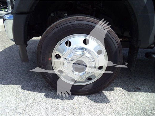 Wheel of a 2022 Ford F550 front showing steel wheel and tire with visible tire tread.
