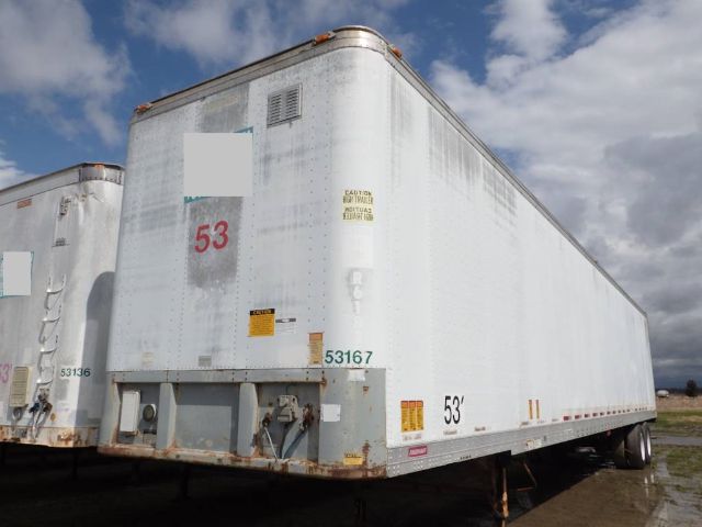 Fruehauf storage/short haul trailer with 53' length, white exterior, rear doors, in-service condition.