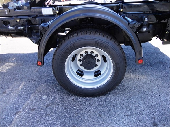 Ram 5500 HD wheel and fender area showing Continental V-Speed HD tire and dual rear wheel well with black chassis components.