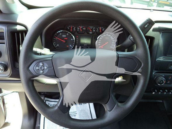 Dashboard and steering wheel of a 2023 International CV truck interior with a watermark overlay.