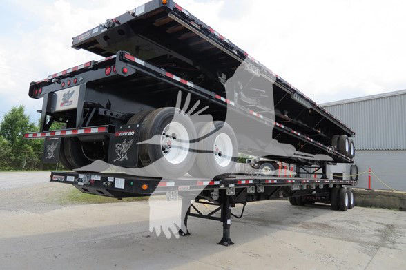 2019 Manac extendable trailer in a raised position showing dual rear axles and landing gear.