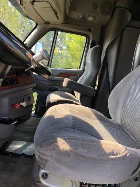 Peterbilt 387 cab interior with steering column, dashboard, and driver seat visible. Text: VIN 1XP7DP9X2BD127225; Category Truck and Trailer; Type Trucks; NewUsed Used.