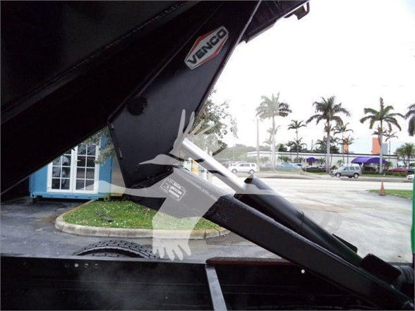 Ford F650 SD dump truck bed with hydraulic mechanism visible, Vin 1FDNF6AY9HDB09276, stock T09276.