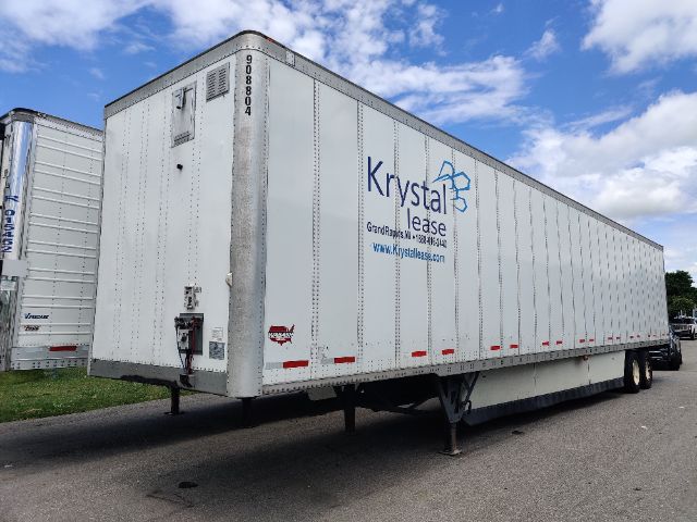 Trailer side with Krystal Lease branding, white, long box, chassis with landing gear visible, stock number 908804 printed on front corner post.