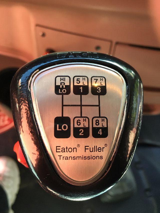 Eaton Fuller transmissions gear selector diagram on a shift knob showing five-speed with reverse and high/low ranges.