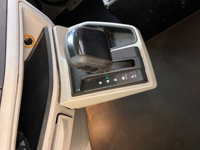 Peterbilt 579 daycab automatic shifter console with gear indicators P R N D M +/- and green indicator light.
