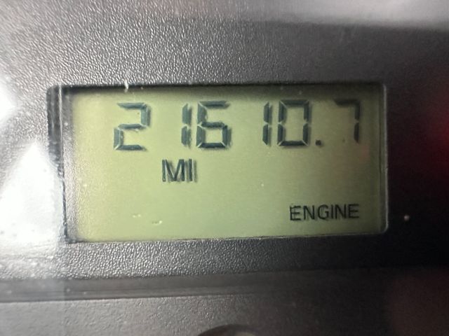 Digital odometer reading shows 21610.7 miles with 'M I' label and 'ENGINE' at bottom right.