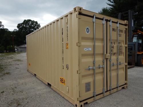 Shipping container with double rear doors showing beige color and metal locking bars.