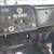 Dashboard area showing gauges and switches with some labels in a Peterbilt cab.