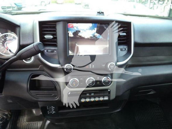 Ram 5500 interior center console with touchscreen display and climate controls.