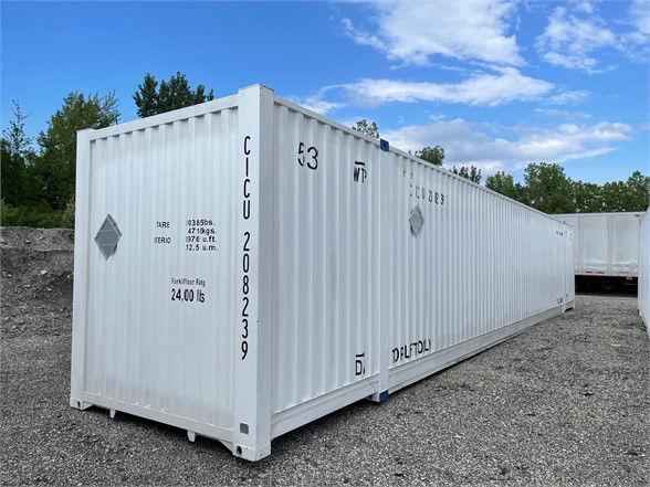 Container showing CIMC 20-foot domestic one-way trailer with markings and serial numbers along the side.