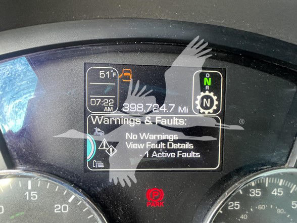 Kenworth dashboard cluster showing 398,724.7 miles, time 07:22 AM, outside temperature 51°F, gear position N, warning panel with No Warnings and View Fault Details -1 Active Faults.
