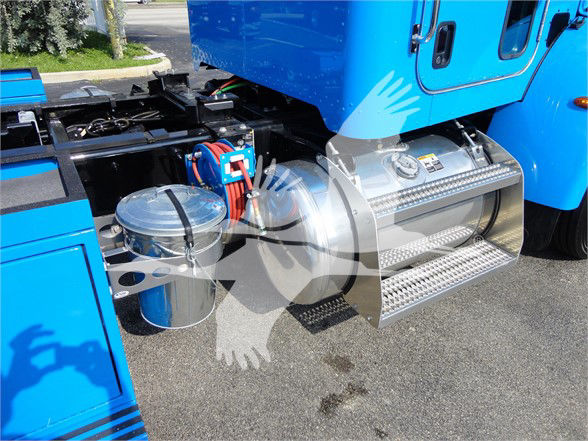 Peterbilt 337 truck side view showing stainless steel steps, fuel tanks, and blue cab with stock components.