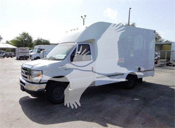 Box truck - 2015 Ford E350 SD in white with high-roof box body, front grille, headlights, side mirrors, and wheel wells visible.