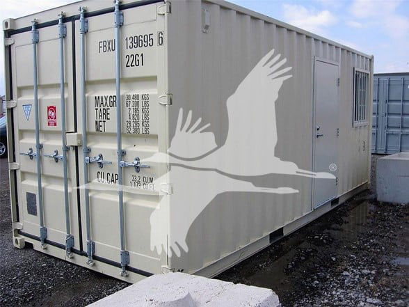 Container trailer with large white logo of two birds in flight on side, rear doors with locking bars, container numbers and various stenciled data.