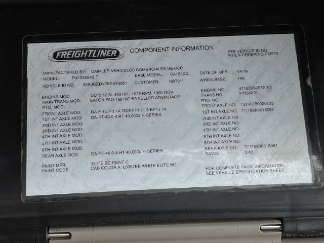 Freightliner component information plate with model numbers, engine model, transmission, axles, paint, and VIN data.