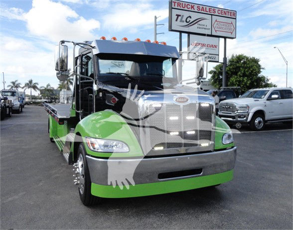 Peterbilt 337 front view showing chrome grille, green and gray color scheme, Tow truck category, stock J56607.