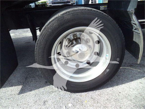 Kenworth T370 wheel and tire showing steel rim and hub area.