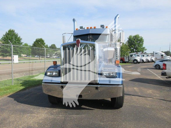 Kenworth W900L conventional daycab truck front view with chrome grille and bumper, stock number U8393 visible in listing.