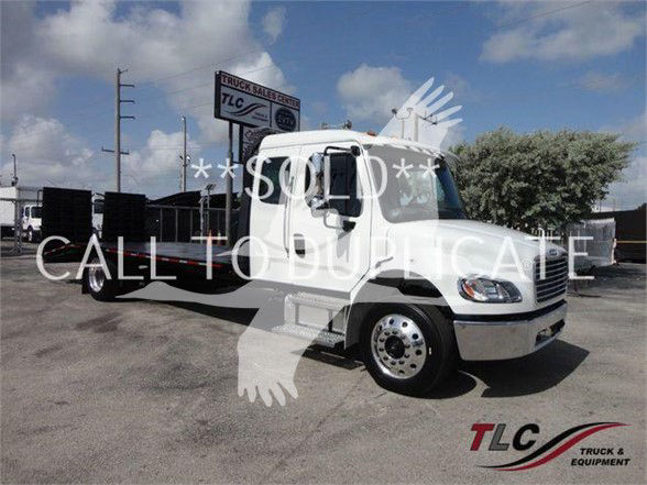 Freightliner Business Class M2 106 truck with flatbed and side rails; TLC Truck & Equipment watermark; 'SOLD' overlay text.