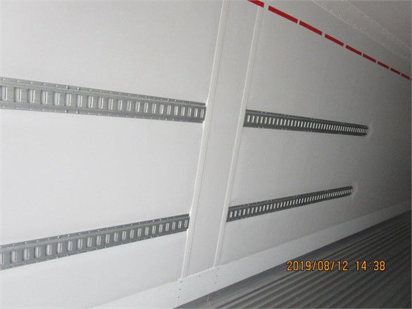 CSX CIMC refrigerated container interior showing attached aluminum E-track rails along wall and a timestamp 2019-08-12 14:38.