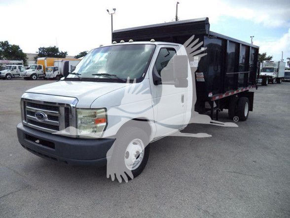 Ford E-Series 2011 Dump Truck with white cab and black dump bed, VIN 1FDXE4FS1BDA83803, stock T83803, used listing.