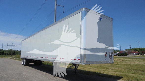 Trailer side and rear of a Vanguard VXP box trailer. No visible text on side besides faint logo.