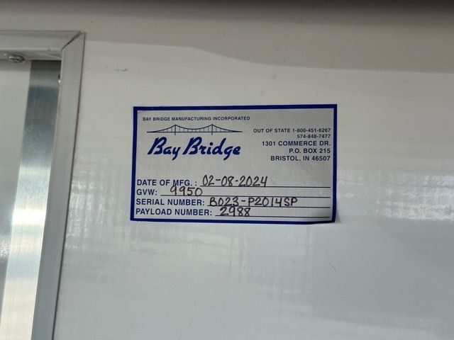 Bay Bridge Manufacturing label on a 2023 Ford Transit 350 box truck showing Date of Mfg 02-08-2024, GVW 9150, Serial Number B023-P20154P, Payload Number 2988.