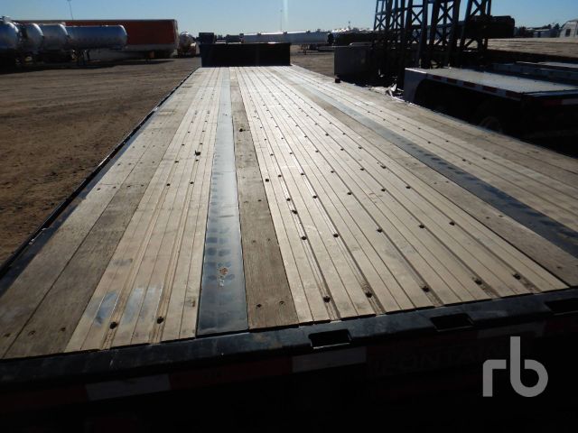Flatbed trailer deck with wooden planks and metal ribs, viewed from front, 2019 Fontaine HCVTX12WSA 40 Ton.