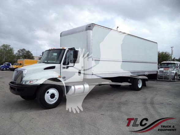 2009-2019 International DURASTAR 4300 box truck showing white cab and large rectangular cargo box, TLC Truck & Equipment logo bottom right.