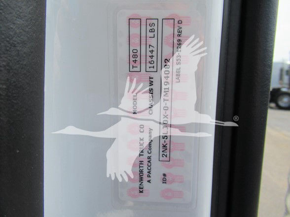 Kenworth T480 VIN plate showing models and weights with serial numbers on a truck door jamb.