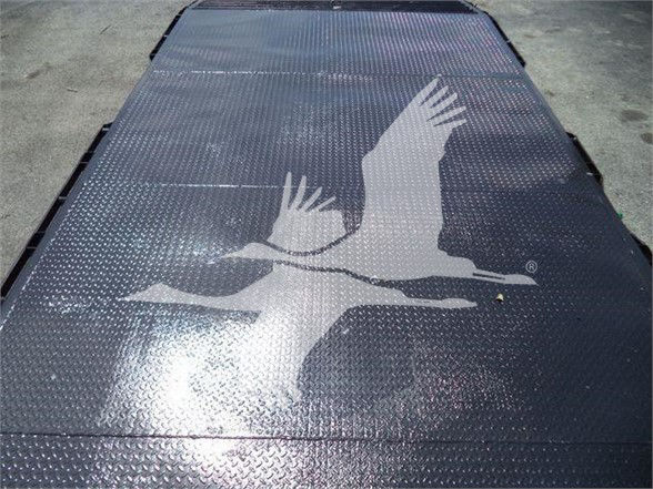 Chevrolet Silverado 6500HD flatbed image with a large eagle graphic on the surface.