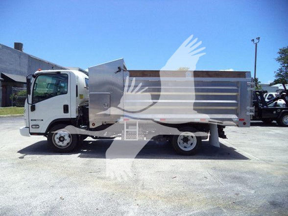 [Vehicle] 2022 Isuzu NQR dump truck side view showing steel dump bed, cab, and wheels.