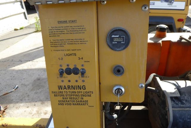 Allmand Night Lite Pro front panel with engine start instructions, lights switch plate, and hour meter.