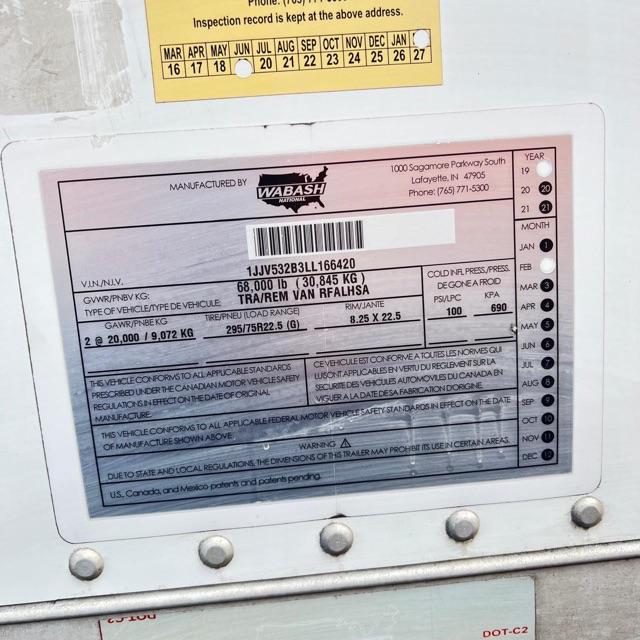 Wabash Arctic Lite trailer VIN sticker details: Manufactured by Wabash National, VIN 1JJV532B3LL166420, GVWR 68,000 LB (30,845 KG), GAWR front/rear 2 20,000 / 9,072 KG, tire sizes 295/75R22.5 (G). Includes date wheel and warning blocks.