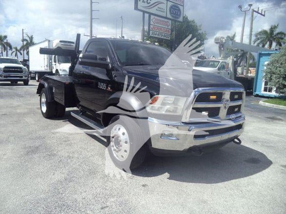 2018 Ram 4500 SLT tow truck front-left view with black cab and chrome grille