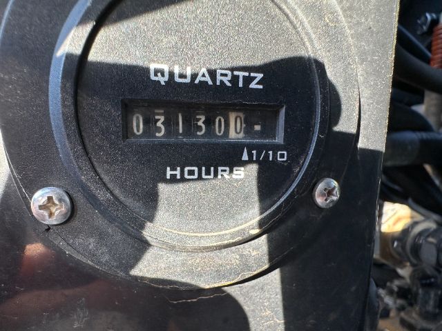 Quartz hour meter reading 13130.0 showing 'QUARTZ' and 'HOURS' on an hour-meter gauge in a Freightliner M2 truck part image.