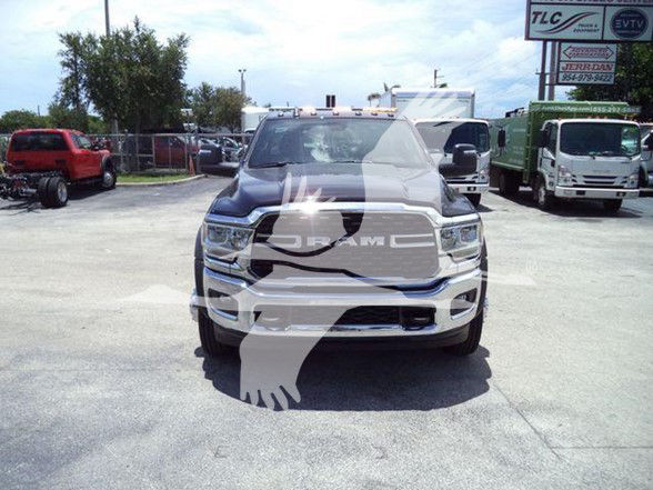 Ram 5500 front view showing large grille and RAM emblem.
