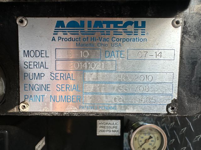 Aquatech plate with model B-10, serial 20141021, date 07-14, pump serial, engine serial, paint number, hydraulic pressure gauge nearby