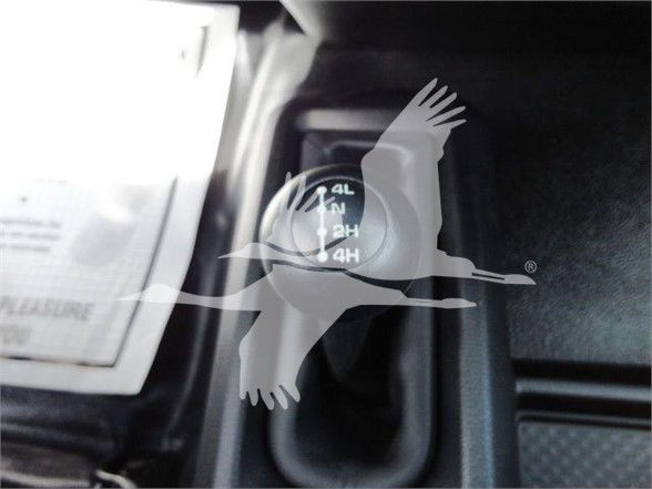 Ram 4500 dashboard area with transfer case selector showing 4L 4H 2H settings.