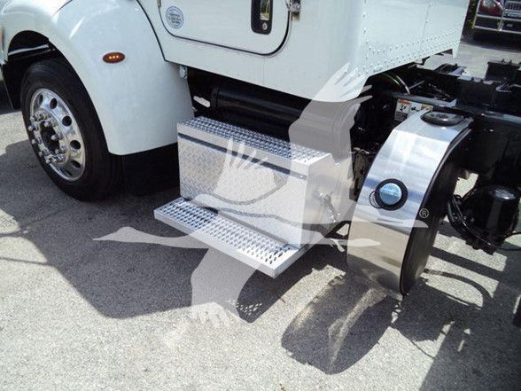 Peterbilt 337 side step with aluminum toolbox and chrome fuel tank area visible